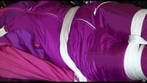 Mara tied and gagged on a sofa wearing sexy pink/purple downwear (Video)