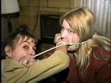 TUBE, BALL, CLEAVE, WRISTS GAGGED & HOG-TIED CARRIE & DEB (D18-2)