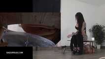 Mistress Cleo squirts cologne into the mouth of the slave lying in the toilet. Picture in Picture