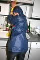 Stella tied, gagged and hooded in the kitchen wearing supersexy blue rainwear (Pics)