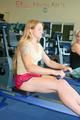 Katharina and Jenny during their workout in the fitness center wearing sexy shiny nylon shorts and tops (Pics)