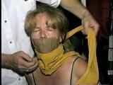38 Yr OLD CASHIER ATTIC BOUND & GAGGED IN A BLACK LEATHER DRESS (D24-6)