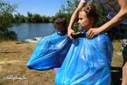 Dana & Ketrin  - Dana joins to her former captive, both are ball tied and trash bag packed