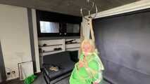Alice bound and gagged in shiny nylon Shorts and Rainjacket
