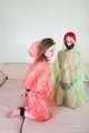 Morrigan and Valeria Ross - Double hogtaped in raincoat