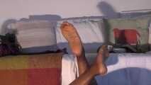 Strappy heels up in the air
