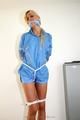 One of our archive girls bound and gagged in shiny nylon shorts