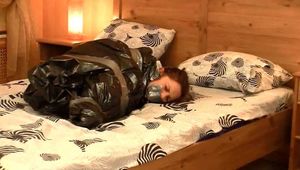 [From archive] Dominica Phoenix - ball taped, packed in trash bag and escapes