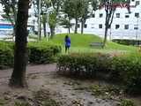 016087 Eve Braves The Light Rain To Find Somewhere To Pee