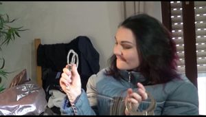 Jill ties, gagges and hoodes herself on a bed wearing supersexy grey shiny nylon downwear (Video)