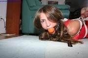 Kathi hogtied topless and in her tight lycra