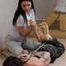 Hazel dominates Gregory, bit-gagged and hogtied with his hands in reverse prayer