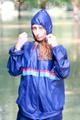 Stella jumping in puddles wearing sexy blue shiny nylon rainwear and rubber boots (Pics)