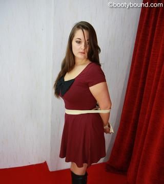 Laura tied up with ropes