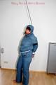 Jill tied, gagged and hooded wearing a shiny blue downwear (Pics)