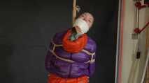 Rachel Adams bound, gagged and double hooded in shiny downjackets