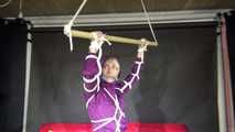 Watching sexy Sonja wearing a supersexy purple shiny nylon rainwear combination being tied and gagged overhead with ropes and a clothgag (Video)