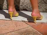 yellow leather mules and tits