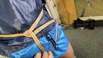 Lena buttplugged, bound and gagged in shiny Shorts and Windbreaker