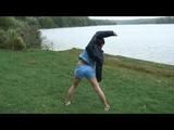Enni during stretching wearing shiny nylon shorts and an oldschool rain jacket (Video)