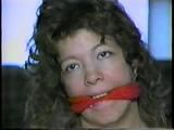 25 YR OLD CHARLENE GETS MOUTH STUFFED, CLEAVE GAGGED, BLINDFOLDED, TIED TO CHAIR, LINGERIE, GARTER BELT & NYLONS (D61-13)