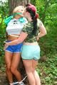 Jill ties and gagges an archive girl outdoor on a tree both wearing shiny nylon shorts and shirts (Pics)