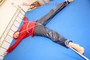 A nice cuty hooded, tied and gagged on bed