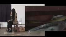 Mistress Cleo squirts cologne into the mouth of the slave lying in the toilet. Picture in Picture