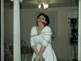 19 Yr OLD JENNIFER IS MOUTH STUFFED, TAPE GAGGED, TIED WITH ARMS OUT AND TO 2 PILLARS & CLEAVE GAGGED (D48-10)d, bondage