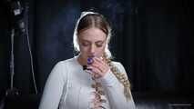 Smoking strong cork cigarette in the studio