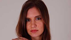 Stacy wearing G-Shock and LIPS handcuffs