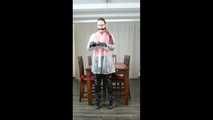 Selfbondage in full PVC outfit and transparent raincoat