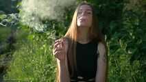 18 y.o. Margarita is smoking three cork 120mm cigarettes outdoors