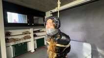 Rey bound and gagged in a shiny Downjacket and Leatherpants