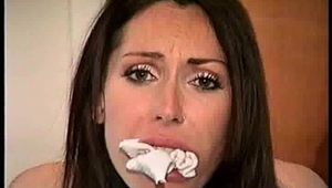 29 YR OLD CHIROPRACTOR GETS HER MOUTH STUFFED, 3 DIFFERENT CLEAVE GAGS, BAREFOOT, TOE -TIED & IS TIED TO A CHAIR (D67-8)