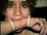 SWEET LATINA MARIE IS BALL-GAGGED, OTM-GAGGED, WRISTS-GAGGED, CLEAVE-GAGGED, MOUTH STUFFED & HANDGAGGED (D48-4)