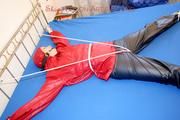 A nice cuty hooded, tied and gagged on bed