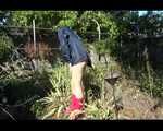 Mara wearing only a hot rain jacket and rubber boots lingering in the garden taking a shower (Video)