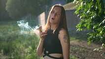 18 y.o. Margarita is smoking three cork 120mm cigarettes outdoors
