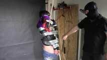 Poor Marie bound and gagged in a shiny nylon Windbreaker