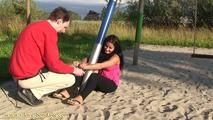Sitting unable to move in the sand