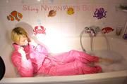Sonja ties and gagges herself in the bath tub with cuffs wearing sexy shiny nylon downwear (Pics)