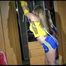 ***NEW MODEL*** Sandra wearing highheels and a sexy blue/yellow shiny nylon shorts and a yellow top tied and gagged with ropes (Video)