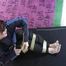 Jill ties and gagges herself in a shiny nylon rainsuit with tape (Video)
