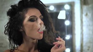 Look at the lovely Daria smoking a strong black Russian 100s cigarette in this closeup video