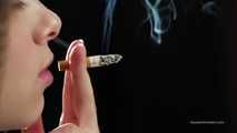 A young lady showing her smoking skills in a closeup video 