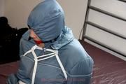 Jill tied and gagged in a shiny nylon oldschool skisuit