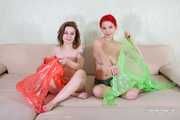 Morrigan and Valeria Ross - Double hogtaped in raincoat
