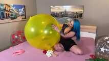 nail2pop big balloons on bed