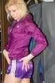 Pia enjoying a cupboard full of shiny nylon clothes trying on purple shiny nylon shorts and rain jacket (Pics)